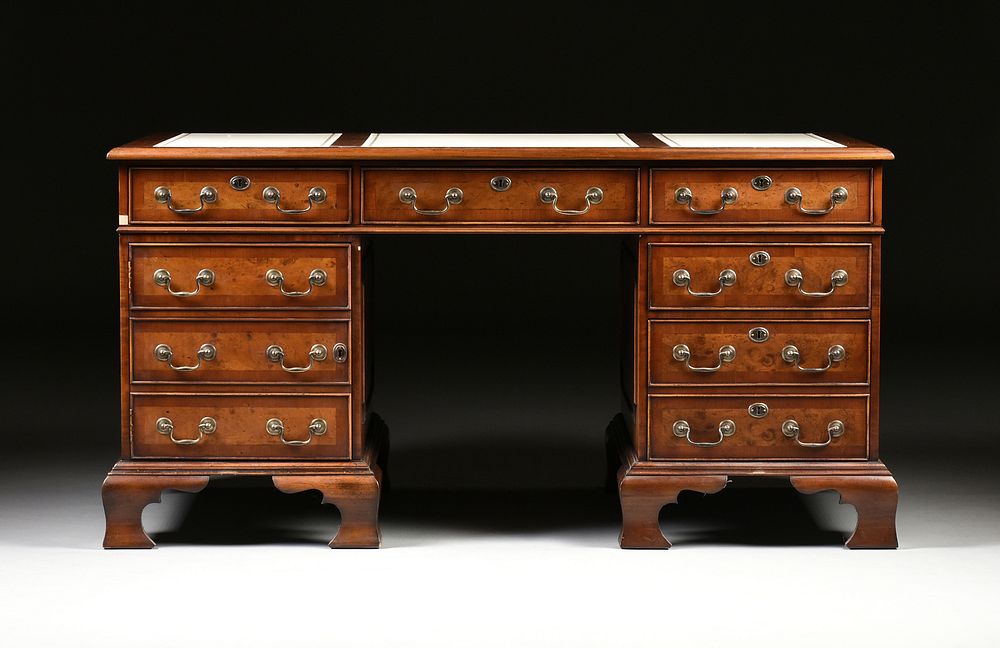 Appraisal: A GEORGE II STYLE WALNUT WHITE LEATHER TOP PARTNER'S DESK