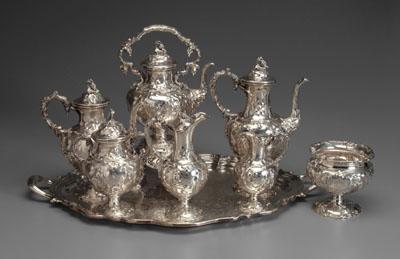 Appraisal: Seven-piece coin silver tea service urn forms and finials chased