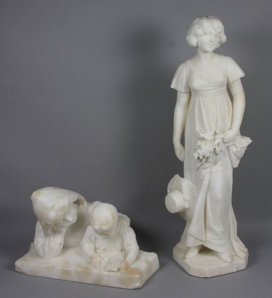 Appraisal: Group of two marble statues young lady with hat early