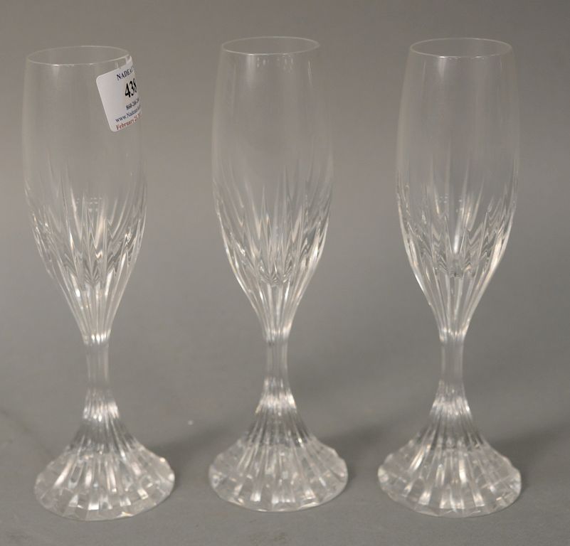 Appraisal: Set of nine Baccarat crystal champagne flutes Massena pattern ht