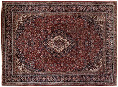 Appraisal: Kashan rug repeating floral designs on brick red field light