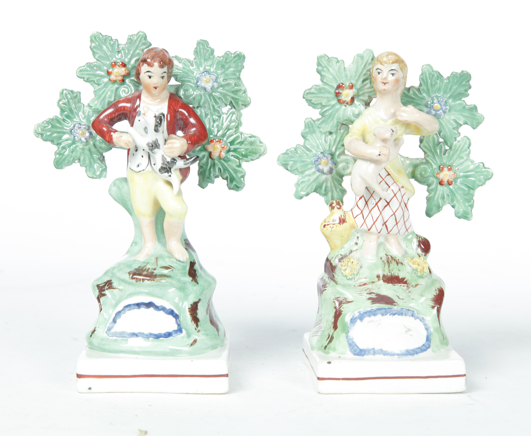 Appraisal: PAIR OF STAFFORDSHIRE FIGURES England ca s Early figures of