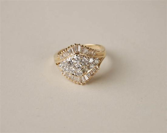 Appraisal: A Gold and Diamond Ring K marked yellow gold ring