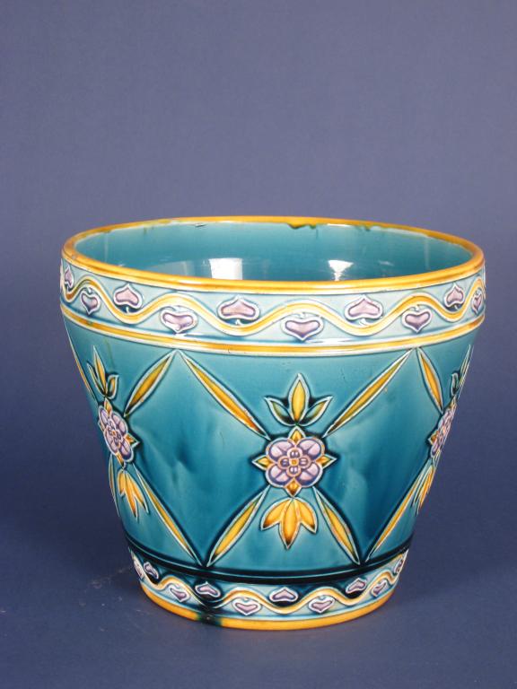 Appraisal: A Minton majolica Jardiniere of straight tapering form moulded lilies