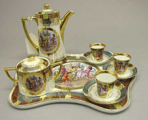 Appraisal: A Vienna style porcelain luster decorated cabaret service first half