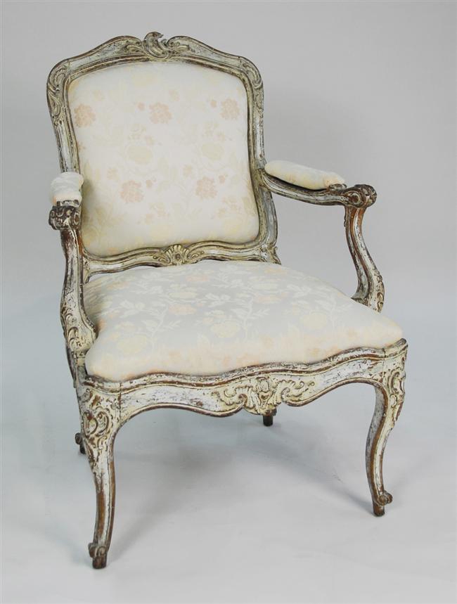 Appraisal: PAIR OF LOUIS XV CARVED AND CREME PAINTED FAUTEUIL Condition