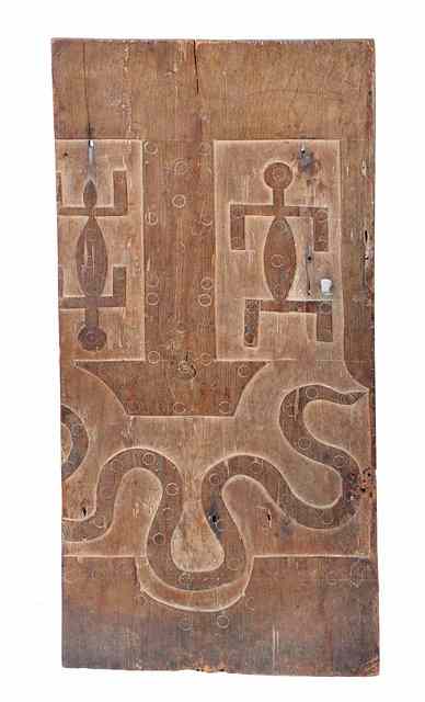 Appraisal: A BURKINA FASO WOODEN GRANARY DOOR decorated two figures and