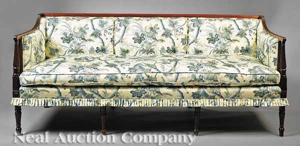 Appraisal: A Sheraton Mahogany Sofa late th c box-form with reeded