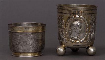 Appraisal: CONTINENTAL BAROQUE ENGRAVED SILVER AND PARCEL-GILT HUNT CUP AND A