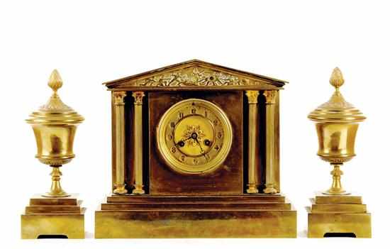 Appraisal: French brass clock garniture late th century architectural case with