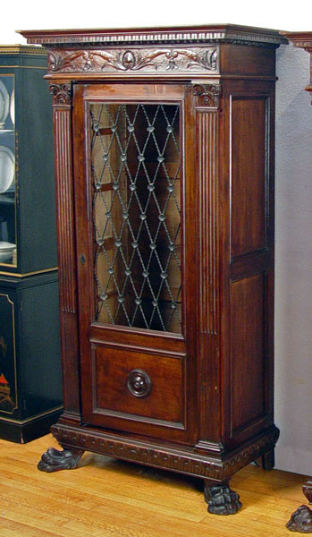 Appraisal: CARVED MAHOGANY SIDE CABINET WITH LION FEET Perfectly suited for