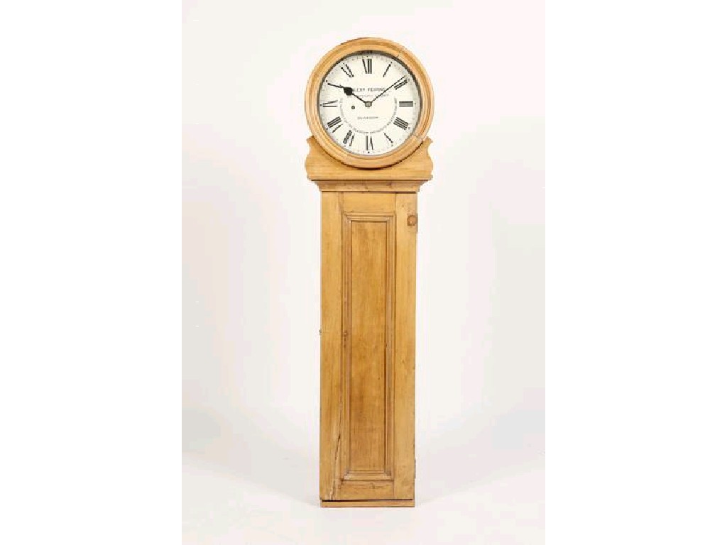 Appraisal: A PINE CASED RAILWAY WALL CLOCK the white enamel dial