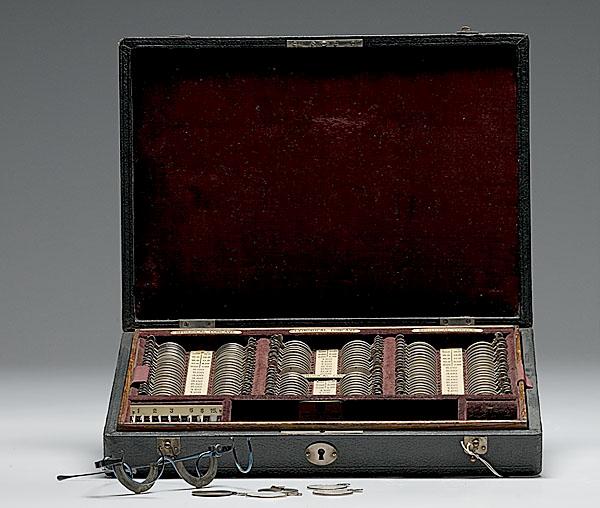 Appraisal: OPTOMETRIST'S TRIAL LENS SET traveling case in the form of