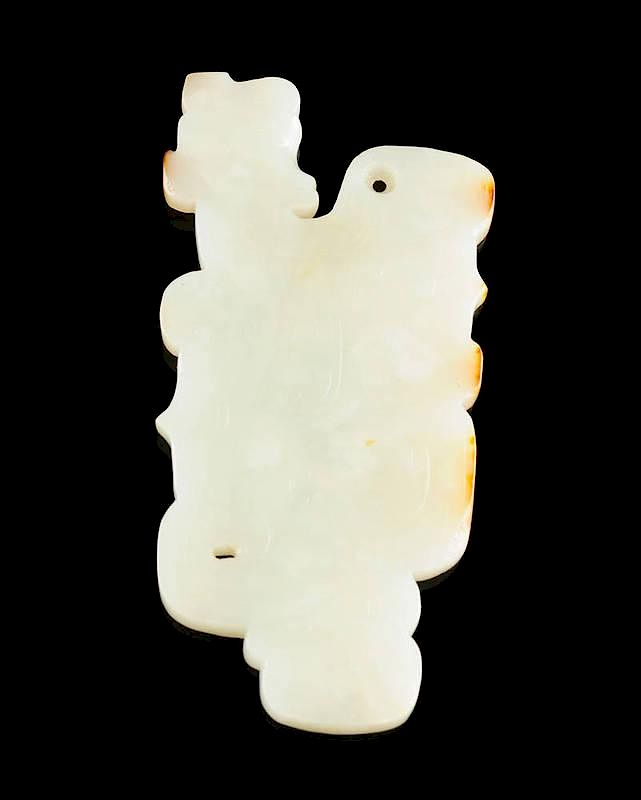 Appraisal: A CHINESE ARCHAISTIC STYLE CARVED WHITE JADE PENDANT A CHINESE