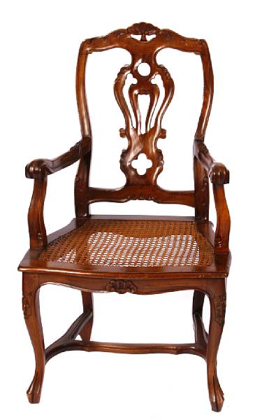 Appraisal: A set of four Italian carved and cane armchairs height