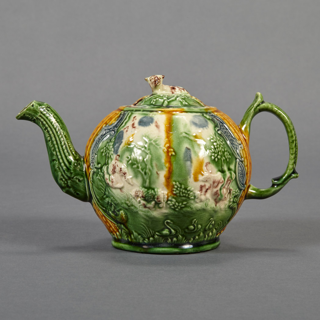 Appraisal: Staffordshire Creamware Teapot Circa The body decorated with pastoral scenes