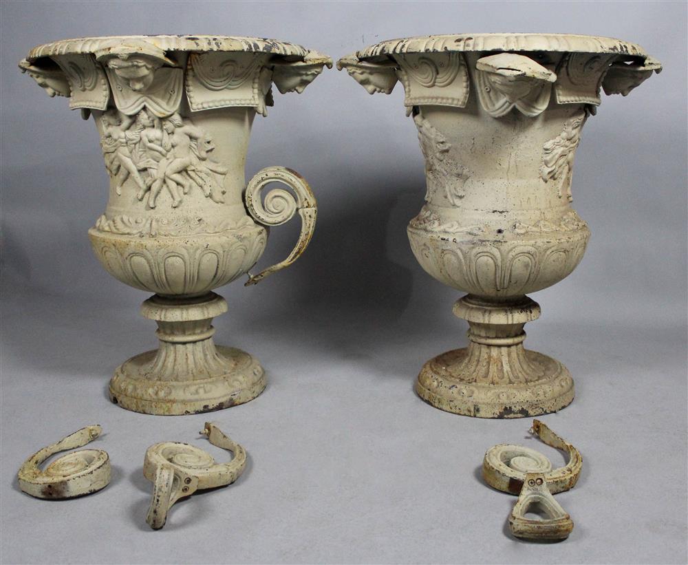 Appraisal: TWO LARGE CAST IRON URNS ON PEDESTALS each with a