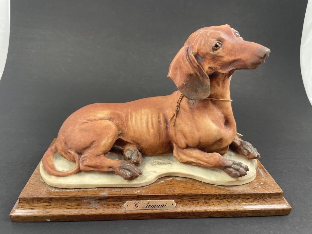 Appraisal: Capodimonte porcelain figurine of a smooth-haired Dachshund designed by Giuseppe