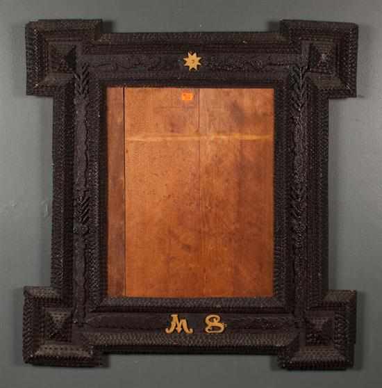 Appraisal: American Tramp Art carved wood picture frame first half- th