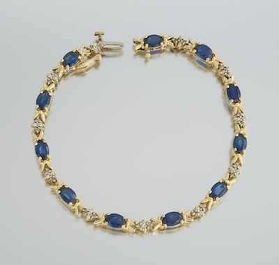 Appraisal: A Ladies' Sapphire and Diamond Bracelet k yellow gold bracelet