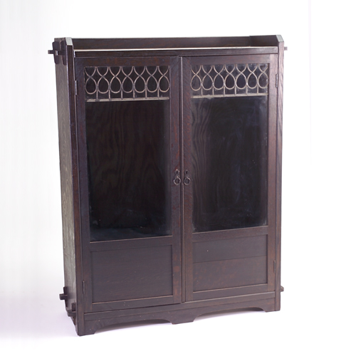 Appraisal: LIMBERT Early double-door bookcase with gallery top mortised through the