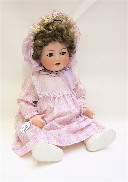 Appraisal: KAMMER REINHARDT BISQUE SOCKET HEAD DOLL having brown wig brown