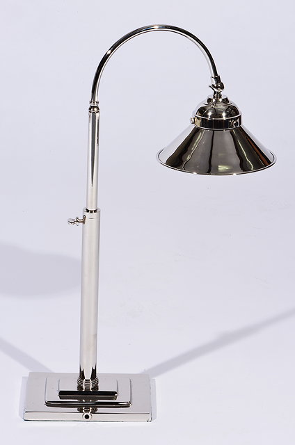 Appraisal: A NICKEL PLATED DESK LAMP of adjustable height on a