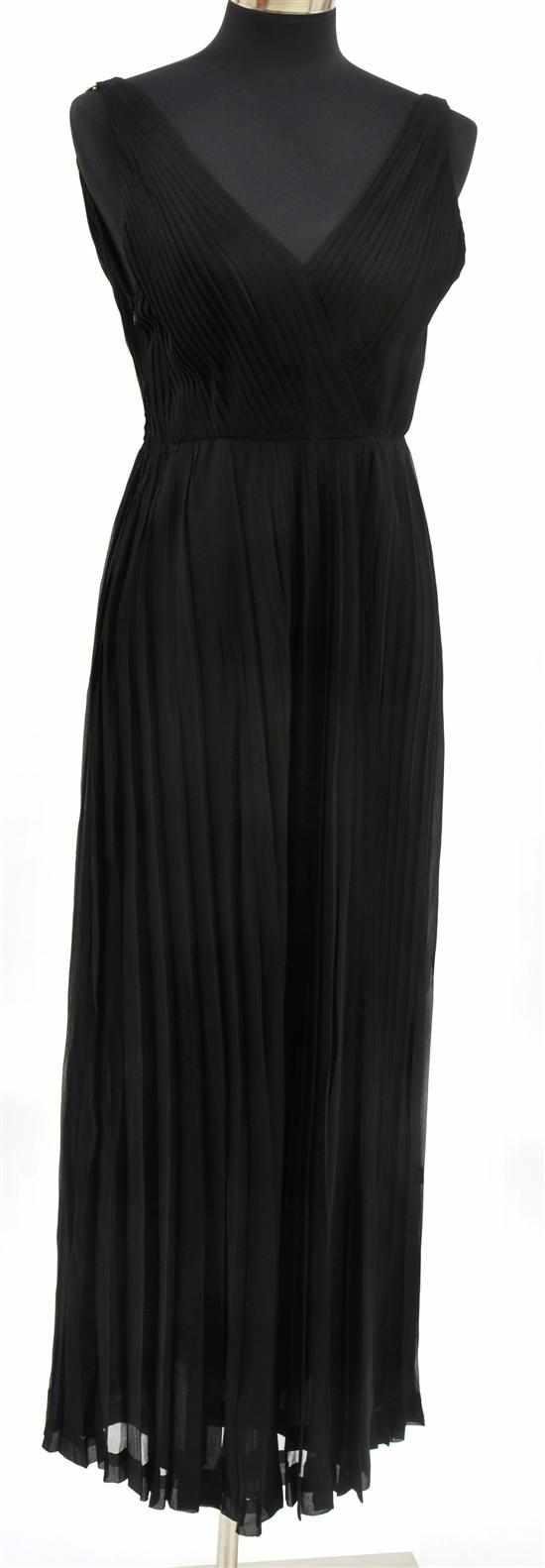 Appraisal: A BLACK PLEATED EVENING DRESS BY ANNE-MARIE CIRCA Labelled '