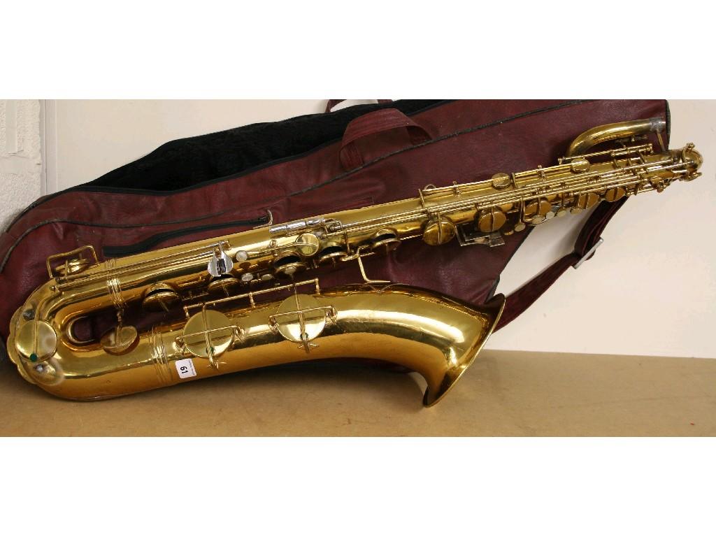 Appraisal: Pennsylvania gold lacquered baritone saxophone made in Czechoslovakia no soft