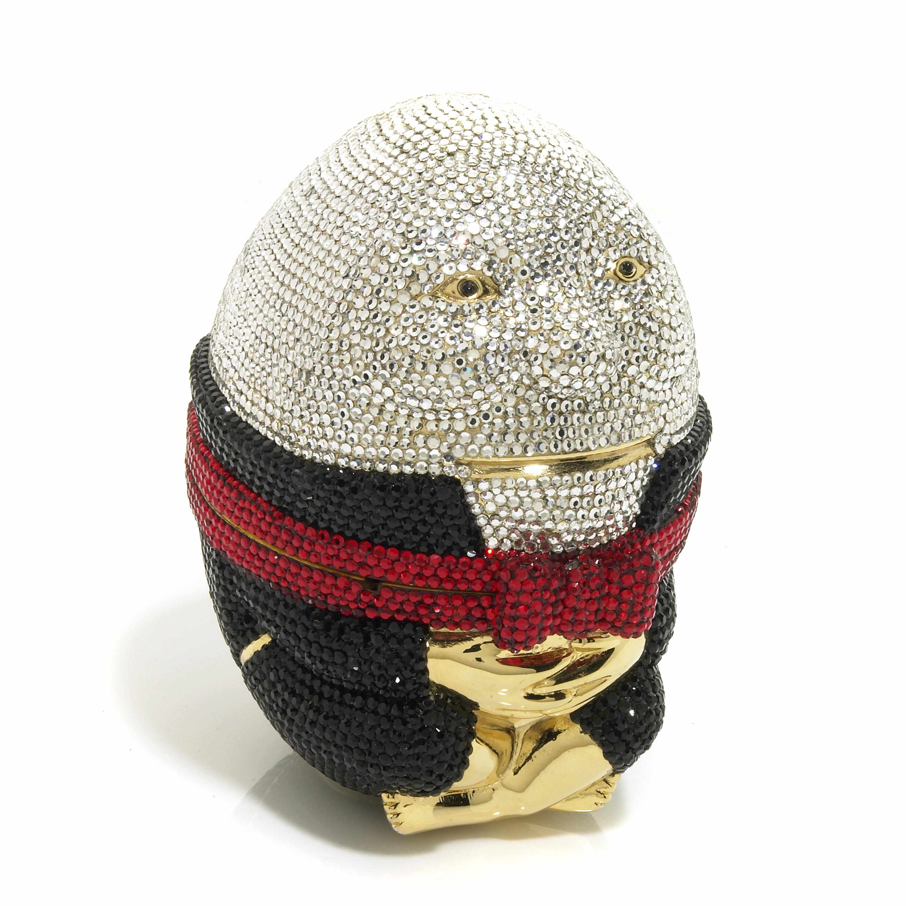 Appraisal: A black silver and red crystal humpty dumpty minaudiere Judith