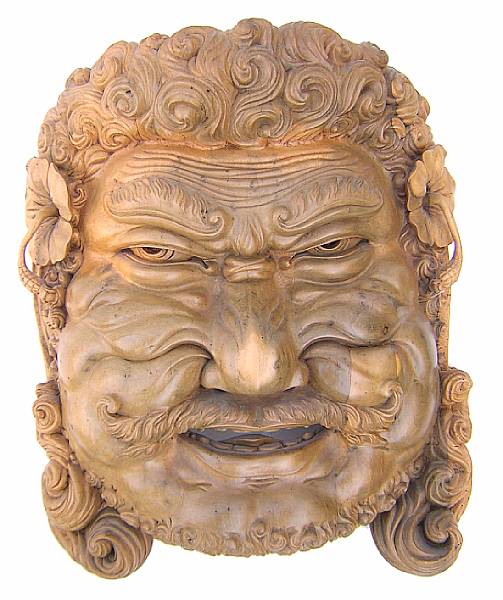 Appraisal: An Indonesian carved wood mask height in