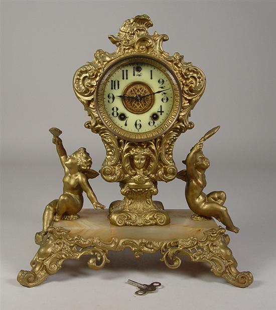 Appraisal: Waterbury Connecticut Figural Clock Circa Cast iron and onyx base