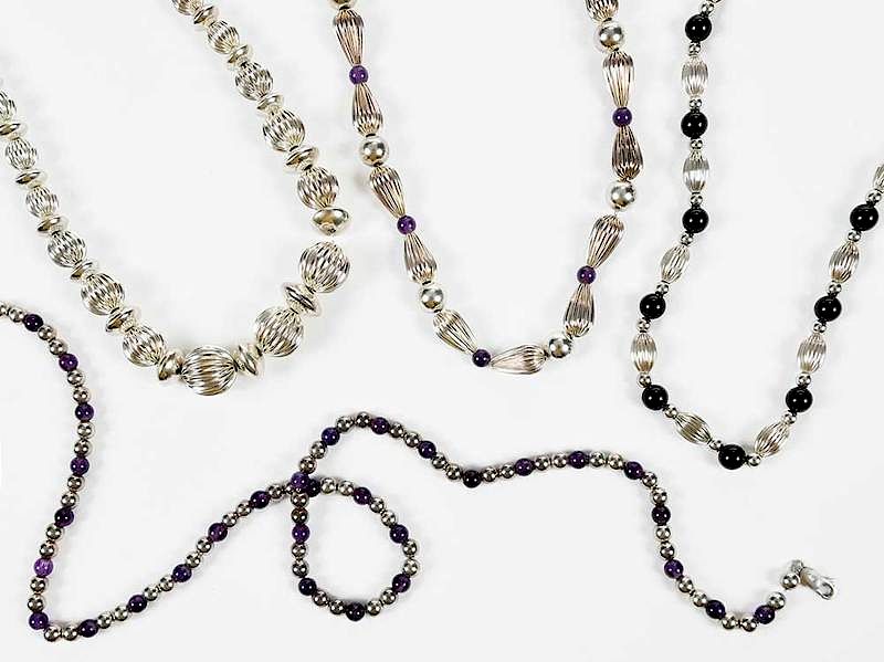 Appraisal: Four Silver Bead Necklaces amethyst and black onyx beads round