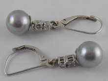 Appraisal: A pair of white metal tests carat gold grey pearl