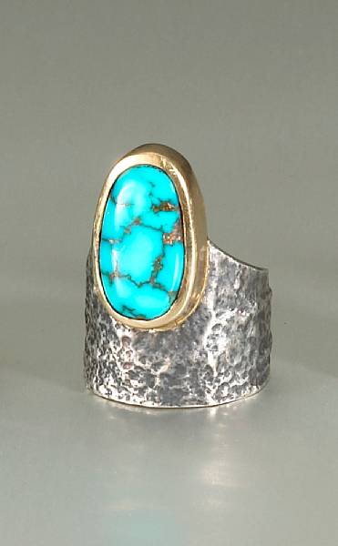 Appraisal: A Hopi ring Charles Loloma the textured silver band with