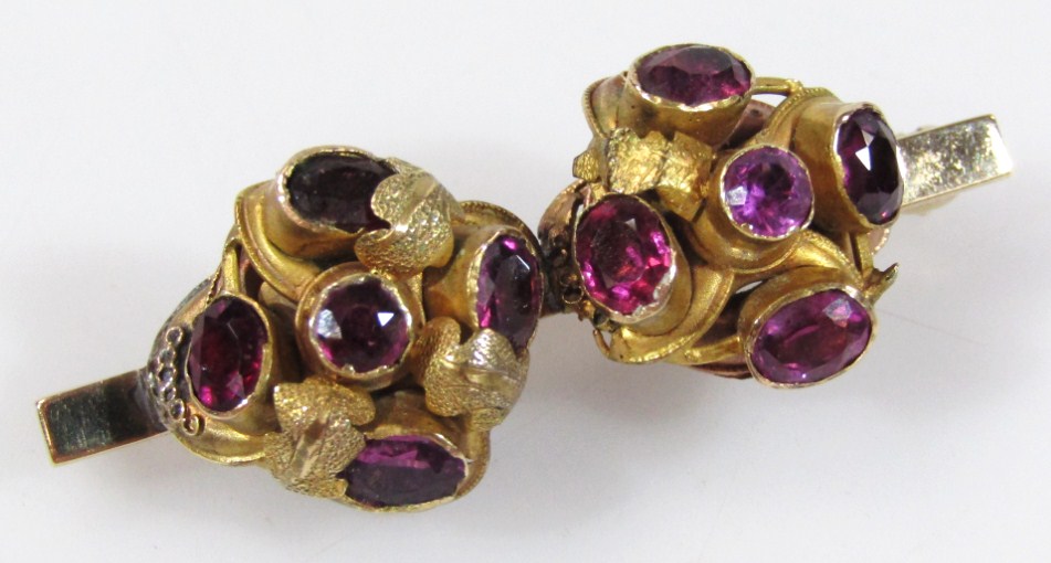 Appraisal: A Victorian double knot stone set brooch with various purple