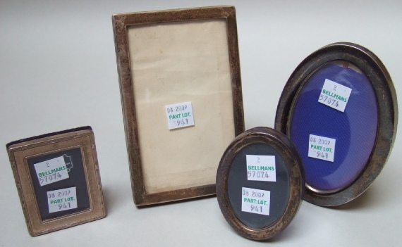 Appraisal: A silver mounted wooden rectangular photograph frame Birmingham and three