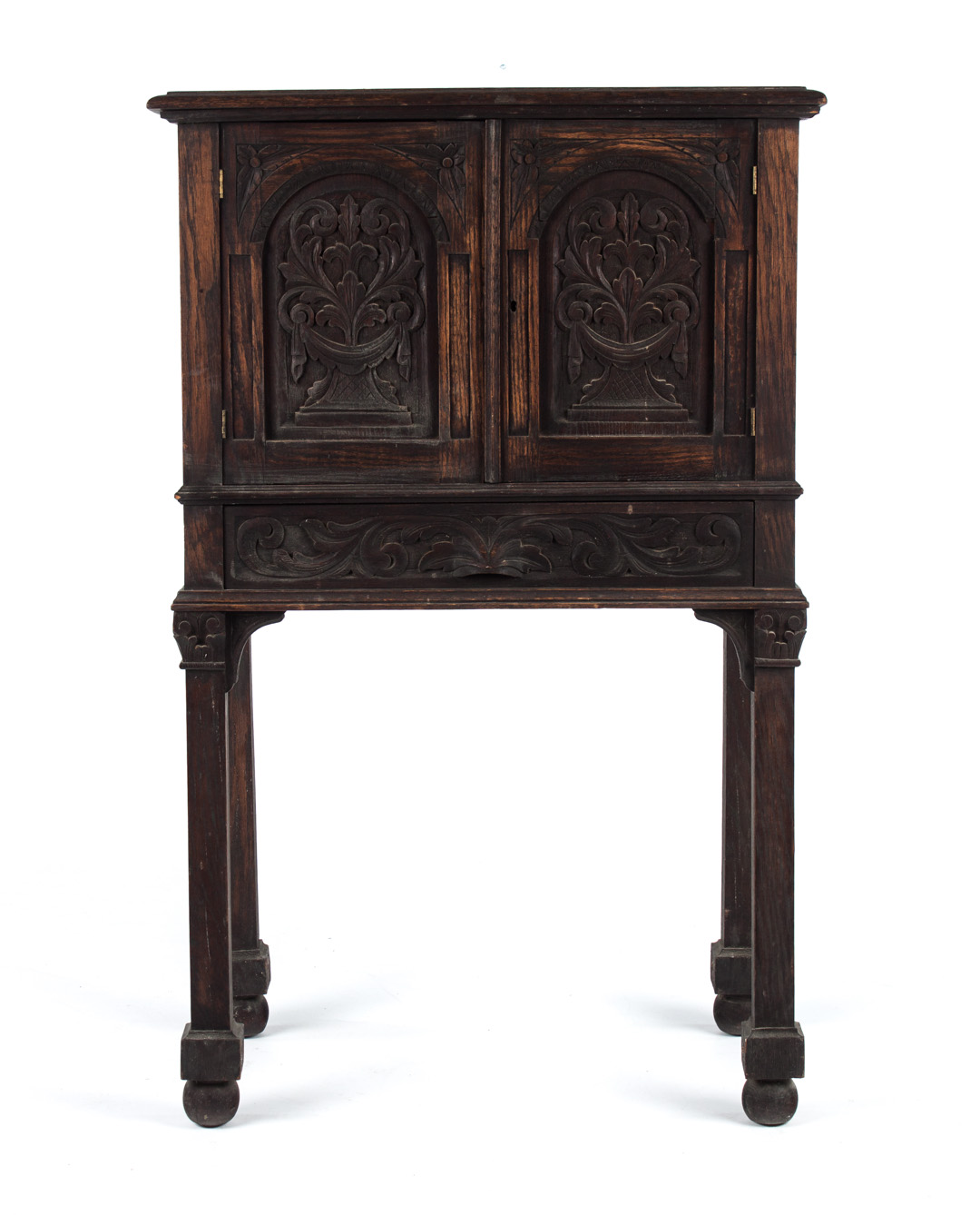 Appraisal: Henri II carved oak cabinet compartment enclosed by solid panel