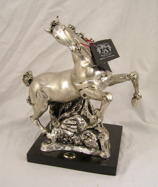 Appraisal: Sterling Horse Figure by Manuel Sterling over composition horse mounted