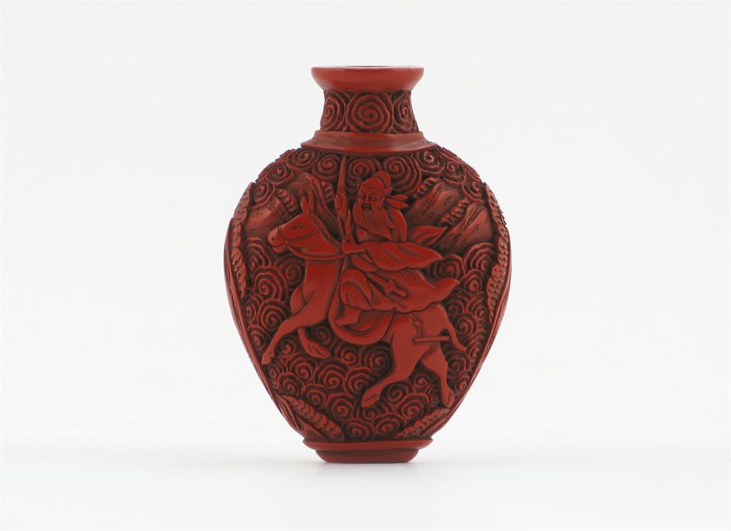 Appraisal: A red cinnabar lacquer snuff bottle