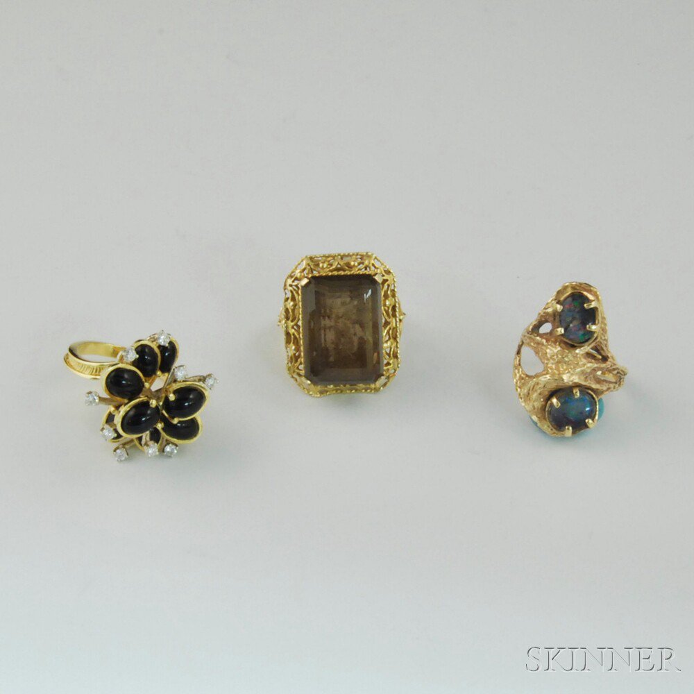 Appraisal: Three Gold Gem-set Cocktail Rings a kt gold and smoky