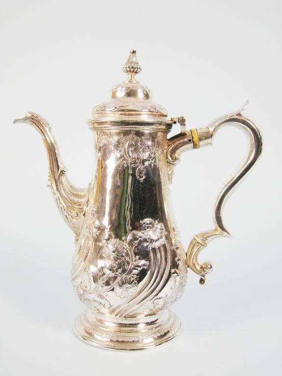 Appraisal: A George III baluster Coffee Pot with floral and spiral