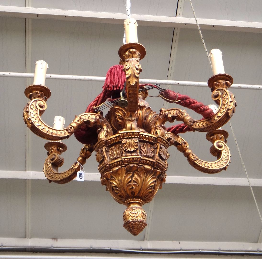 Appraisal: A Louis XVI style giltwood carved six branch chandelier modern