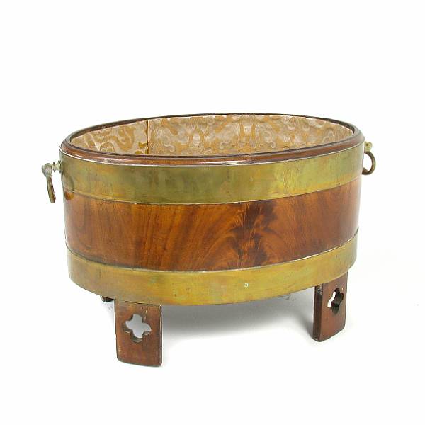 Appraisal: A George I style mahogany and brass bound peat bucket