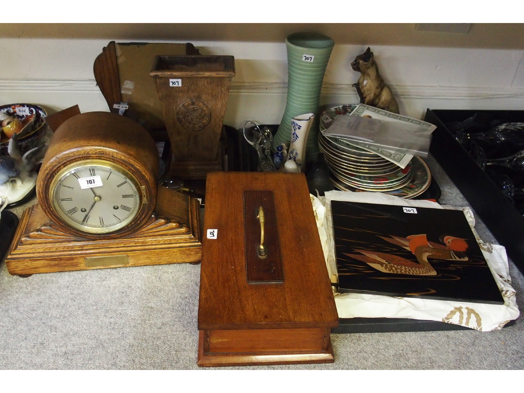 Appraisal: Pair of mahogany bookends oak mantle clock oak vase mahogany