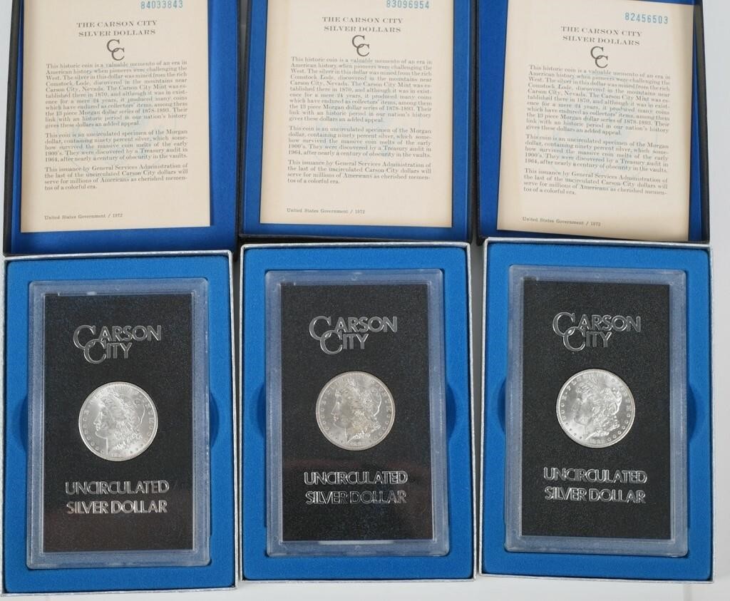 Appraisal: Three GSA brilliant uncirculated Carson City Morgan silver dollars Dates