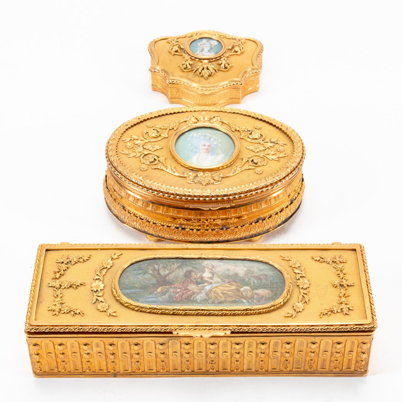 Appraisal: FRENCH GILT DRESSER BOXES W MINIATURE PORTRAITS French th century