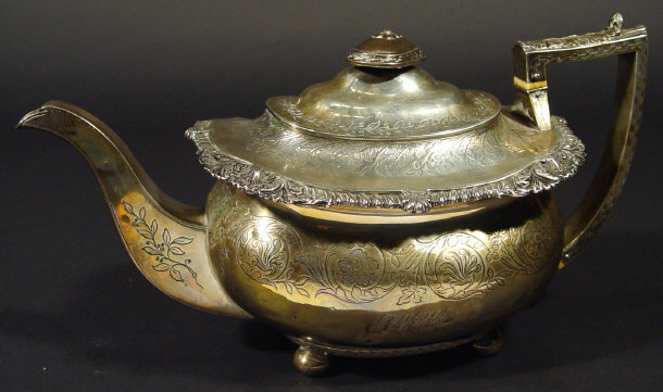 Appraisal: th Century silver teapot the body profusely chased with leaves