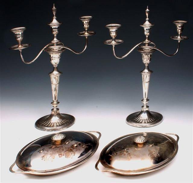 Appraisal: A PAIR OF LATE VICTORIAN SILVER THREE BRANCH CANDLESTICKS with