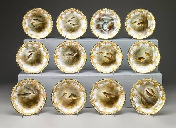 Appraisal: A set of twelve English porcelain ichthyological plates painted by